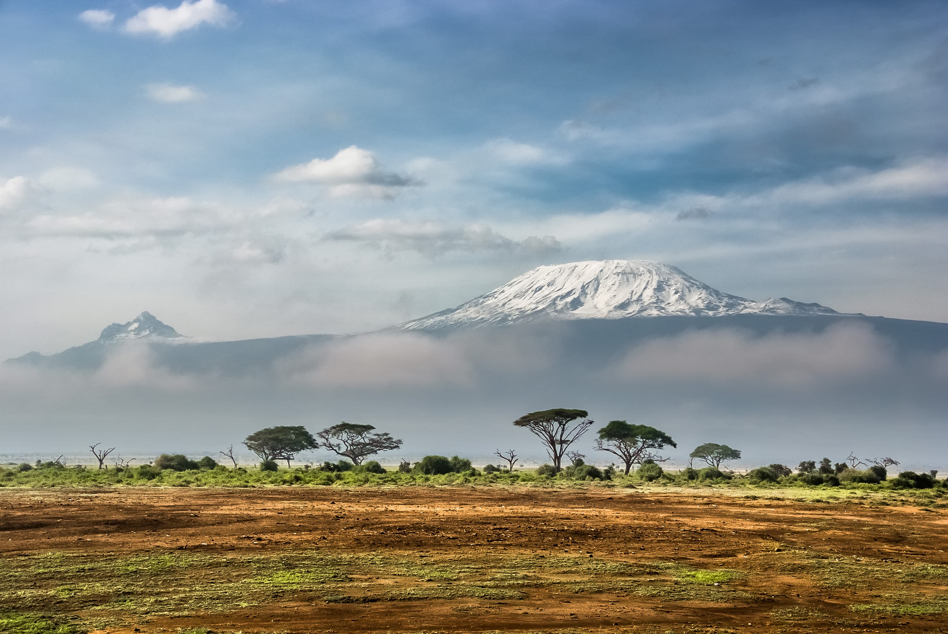 Snow-capped Mount Kilimanjaro rising above the Amboseli plains